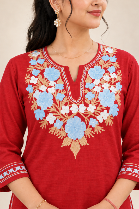 Red Aari work long kurti in ruby cotton — close-up of the embroidered neckline