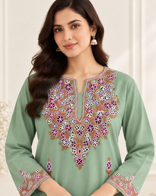 Green Aari work co-ord set in ruby cotton — close-up of the embroidered neckline