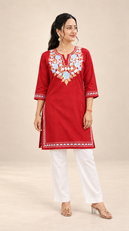 Red Aari work long kurti in ruby cotton — model wearing it, front view