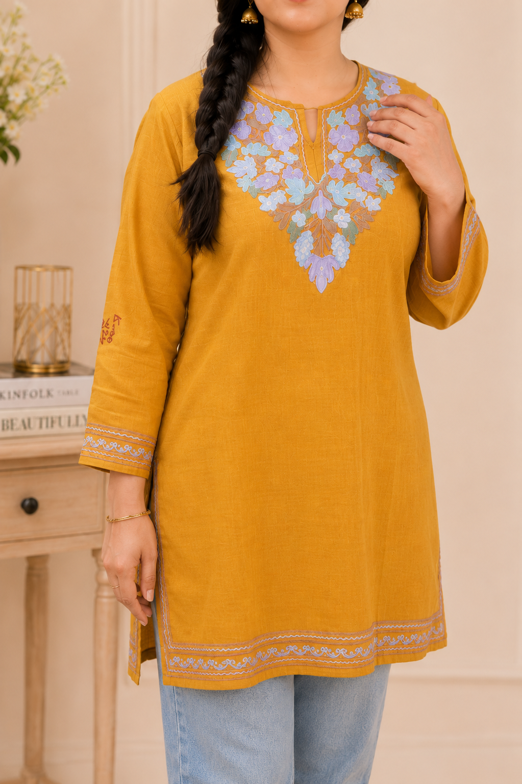 Intricately Aari Worked Ruby Cotton Short Kurti in Golden Blue
